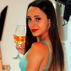 Melina Belén, a Model from Argentina, Poses with Wine Glass