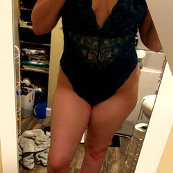 Mrs. S in a Bathroom Mirror