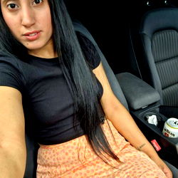 Gipsy_princess posing in a car for a photo