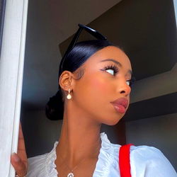 Am I The One, a South African model with striking features and confident demeanor