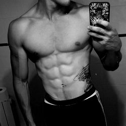 Shredded Fitness Model Showcasing Abs, Spain