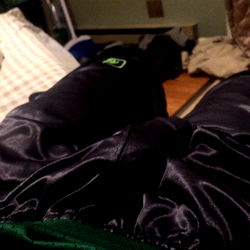 A Comfortable Bedroom Scene with a Personal Touch