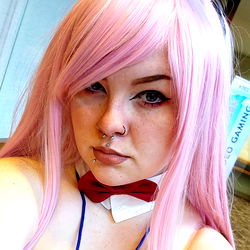 Fantasy-Inspired Cosplay with Vivid Pink Hair and Accessories