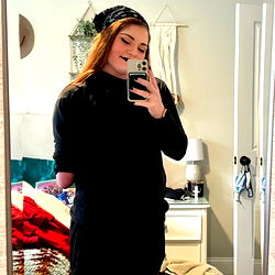 Kaitee, a TikTok Star Standing in Her Bedroom