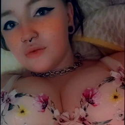 Baby Girl: Striking OnlyFans Model in Vibrant Floral Bustier