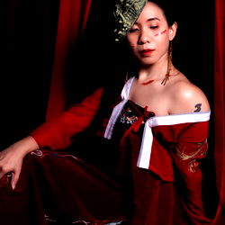 Striking Red and Gold Geisha