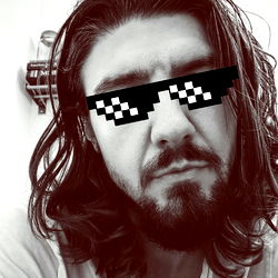 Bearded Man in White Tee and Sunglasses