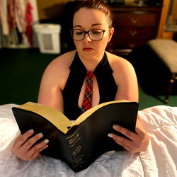 Model in a Beaded Dress Reading the Bible