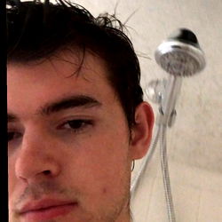 OnlyFans Model FeetForFans Shares a Personal Moment in Bathroom