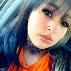 BarbieUndead's Vibrant Tattoo and Piercing Style on Idaho