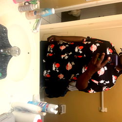 OnlyFans Model Showcasing Selfie in Bathroom Mirror