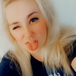 Blonde Woman Sticking Out Tongue for Selfie