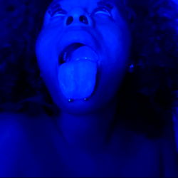 Intimate Moment in a Purple Room