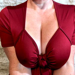 OnlyFans Model 'Goddess Kira' in a Red Dress, Captured from the Side