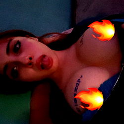 Model with Fire Tattoos Showing Off