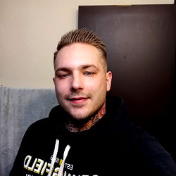 U24 Male Model With Tattoos and Blonde Hair