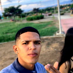 Smiling Young Man in a Field