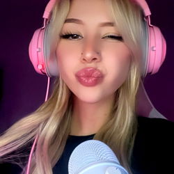 Woman in Pink Cat Ears and Headset