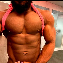 Fit Model Showcasing Muscles and Abs