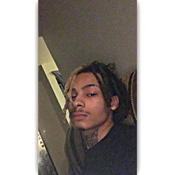 OnlyFans Model 'DaRealDevv' in Intimate Moment, Showcasing Personal Side