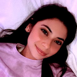 OnlyFans Model Nautii Poses on Bed