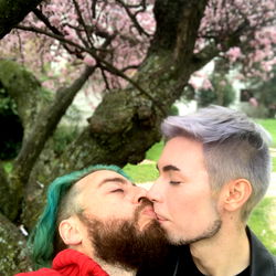 Emotional Moment Between Two Men in Park