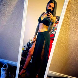 Tall, Tattooed Model Strikes a Pose in Her Room