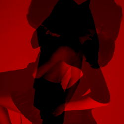 Red and Black Blurred Image of a Model