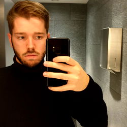 Paolo, Young Swiss Model in Black Turtleneck and Shades, Posing in Bathroom