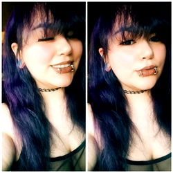 Aesthetic Portrait of Emily Ramirez with Purple Hair and Tattoos