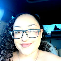 Smiling OnlyFans Model in Car