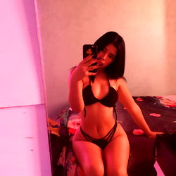 Ximena, a Beautiful and Curvy OnlyFans Model in a Stylish Black Bikini