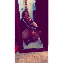 OnlyFans Model Dayz Mae Posing in Faux Fishnet Leggings and a Black Jacket