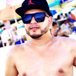 Shirtless Man at Beach