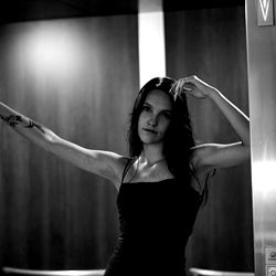 Emily, OnlyFans Model Striking a Pose in Elevator