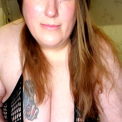 Trinity Pleasures, a Canadian OnlyFans Model in her swimsuit