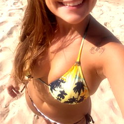 Beautiful Woman Posing on Beach