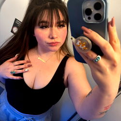 OnlyFans Model Briea Peach Taking a Selfie in the Airport