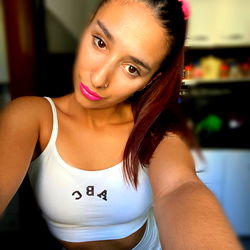 OnlyFans Model Vicky Green Posing in White Tank Top