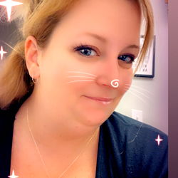 Amy Gray, the Erotic Novelist, in Her Reading Nook