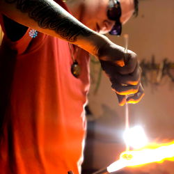 Artisan Crafting Glass Flower at Home