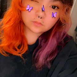 Model SpookyGirl69 in Colorful Hairstyle with Butterfly Makeup
