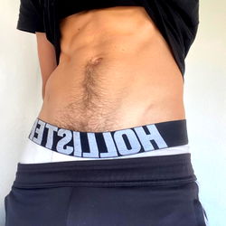 OnlyFans Model Showcasing Abs