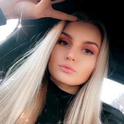 OnlyFans Model Kat, Striking a Peace Sign