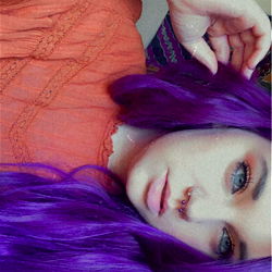 Vibrant-Haired Female with Colorful Hair and Ruffled Blouse