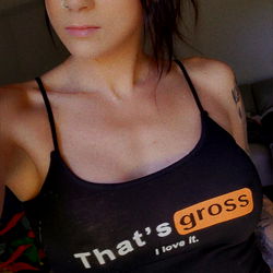 Onlyfans Model Skadger, Stylish in Black Tank Top with Red Logo and Horns