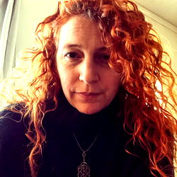 Brooke, A Vibrant Woman with Red Hair and a Unique Style