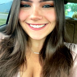 Smiling Woman in Vehicle