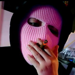 Person with Face Mask and Pink Hoodie