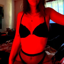 Model Bree in Red Fishnet Lingerie